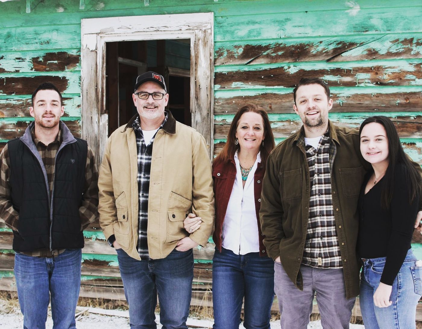 The Leutschaft family standing together